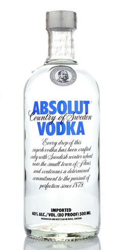 an empty bottle of vodka on a white background