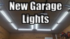 the new garage lights are on and there is an overhead light in the middle of the room