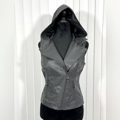 Nwot - No Tags. Sample Item. One Of A Kind! Runway Ny Sample Genuine Leather Hooded Vest Moto Jacket Zip Up Lined Black Size Small Measurements (Flat): Bust: 19” Length: 20” Fitted Hooded Leather Jacket For Cold Weather, Casual Fitted Biker Jacket With Detachable Hood, Fitted Hooded Biker Outerwear, Fitted Biker Outerwear With Hood, Fitted Biker Outerwear With Double-lined Hood, Biker Style Fitted Outerwear With Double-lined Hood, Hooded Biker Jacket For Cold Weather, Casual Hooded Biker Jacket For Cold Weather, Sasha Morozova