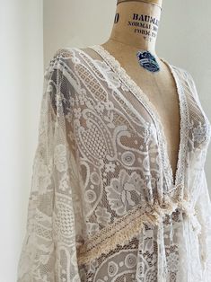 Boho Ivory Lace Wedding Dress With Fringe Maternity Wedding - Etsy Bohemian V-neck Dress With Delicate Lace, Flowy Bohemian Lace Dress With Lace Trim, Bohemian Flowy Lace Dress With Lace Trim, Bohemian Flowy Dress With Delicate Lace, Flowy Lace Patchwork Wedding Dress, Bohemian Cream Dress With Scalloped Lace, Flowy Lace Patchwork Dress For Wedding, Bohemian Flowy Lace Dress With Lace Sleeves, White Bohemian Dress With Lace Bodice