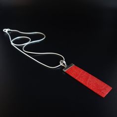 Mens silver chain pendant necklace Red Coral gemstone, Handmade jewelry for men, Unique gifts for men Gnatus all-stone Pendant with natural red Coral and sterling silver hook. The unique long rectangle shape and the natural red/orange color, adds a unique mat spark and gives a modern touch to this pendant. It is thoughtfully set into 925 Sterling silver and a 10mm hook is placed on the upper part of the pendant for perfect balance. Modern design for Men and perfect gift for him. The Pendant feat Red Minimalist Pendant Necklace, Minimalist Red Pendant Necklace, Handmade Red Necklace With Rectangular Pendant, Mens Silver Chain, Mens Pendant Necklace, Silver Chain Pendant, Mens Necklace Pendant, Silver Chain For Men, Coral Gemstone