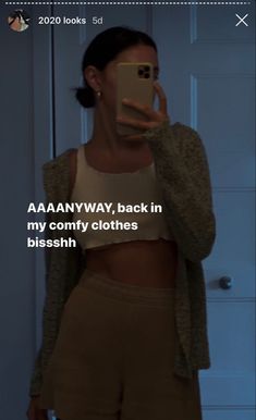 a woman taking a selfie in front of a mirror with the caption'aaaanny way, back in my comfy clothes bleash '