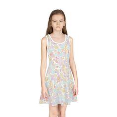 Crafted from high-quality materials, this dress is perfect for any occasion, from a casual day out to a special event. The playful candy pattern in soft pastel colors will make your little girl stand out and show off your unique sense of style. She will absolutely love it! The dress is designed with comfort in mind, featuring a soft and breathable fabric that will keep you cool and comfortable all day long. The lightweight design is perfect for warm weather, and the adjustable straps ensure a perfect fit. .: Material: 95% polyester, 5% spandex .: Medium fabric (6.5 oz/yd² (220 g/m .: Mid-length .: A-line cut .: Seam thread color automatically matched to design (black or white) White Sweet Mini Dress For Summer, Playful Multicolor Sundress For Spring, Playful Mini Dress For Spring, Playful Floral Print Mini Dress For Spring, Playful Floral Print Sleeveless Summer Dress, Playful Spring Printed Dress, Playful Printed Spring Dress, Fitted Playful Mini Dress For Spring, Cute Mini Sleeveless Dress For Spring