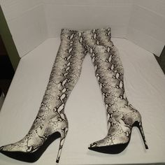 Nwot These Gorgeous Statement Thigh High Boots Are In “Natural Snake” With 4” Heel And Pointed Toe & Zipper On Inside. Size 6m 4” Heel 17” Shaft Circumference 24” Shaft Height Stiletto Heel Materials Are Pictured. Does Not Come In Original Box Reposhing This Item I Purchased From @Melinda2931. Loved It, But Ready To Rotate For Something New. Questions? Leave A Comment Below! Trendy White Thigh High Boots, Fitted Thigh-high Beige Boots, Fitted Beige Thigh-high Boots, Fitted Cream Knee-high Boots For Fall, Cream Fitted Knee-high Boots With Round Toe, Fitted Cream Knee-high Boots With Round Toe, Chic Cream Fitted Knee-high Boots, Chic Fitted Cream Knee-high Boots, White Over-the-knee Winter Boots