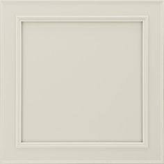 an empty white frame on the wall