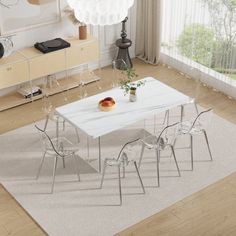 a white table and chairs in a room