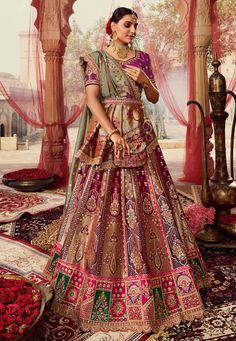 Purple banarasi silk lehenga choli 10252 Desc: Style : Circular Lehenga Choli Color : Purple Fabric : Banarasi Silk Work : Sequence Embroidery Wash Care : Dry clean Sleeve Style : Short Sleeve Long Sleeves : Done only in Custom Stitch Sleeves Lining : Done only in Custom Stitch Bust Size : 32 to 42 Inches Occasion : Wedding Mehendi Sangeet Bridesmaid Reception Baby Shower Teej Engagement. With Express Free Shipping Buy Lehenga - Indian Party wedding and bridal Purple banara... Multicolour Lehenga, Lehenga Look, Elegant Lehenga, Saree Gown, Lehenga Choli Online, Red Lehenga, Traditional Indian Outfits, Bridal Lehenga Choli, Wedding Lehenga