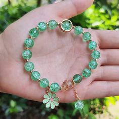 Sparkle and shine all day long with this stunning bracelet.Elegantly designed to showcase your unique sense of style. Natural Crystal Bead diameter: 8 mm，Large bead diameter: 10 mm Elastic - Suitable for hand circumference: 14-19 CM Hypoallergenic, lead & nickel free *The gemstones are light green to white in color. We carefully select each gemstone to offer gems with the best quality. As gemstones are natural materials, stone colors may vary slightly from the images, making this beautiful bracelet completely unique, just like you!If you aren't in LOVE with your purchase, please let us know within 30 days of receiving your item, and you'll receive a stress-free refund. Elegant Green Charm Bracelet With Round Beads, Elegant Turquoise Round Bracelet, Elegant Round Turquoise Bracelet, Elegant Turquoise Adjustable Charm Bracelet, Elegant Green Stretch Bracelet With Faceted Beads, Elegant Green 8mm Beads Jewelry, Elegant Green Jewelry With 8mm Beads, Elegant Charm Bracelet With Gemstone Beads, Elegant Green Stretch Bracelet With Round Beads