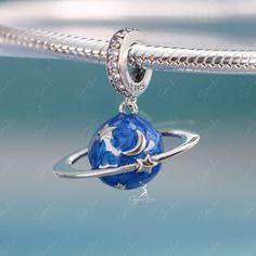 This is charm only, bracelet is sold separately. This beautiful enamel blue planet pendant charm is made of solid 925 sterling silver and enamel color, features 3D blue planet with moon and star. This planet dangle charm will fit original bracelet or wear as a pendant for necklace. Experience the wonder of the universe with our stunning Blue Planet pendant charm! Crafted from solid 925 sterling silver and vibrant enamel, this charm showcases a 3D blue planet adorned with a glowing moon and star. Blue Sterling Silver Charms For Jewelry Making, Festival Jewelry With Blue Moon Charm, Celestial Jewelry With Dangling Charms In Sterling Silver, Blue Round Jewelry With Star Charm, Blue Sterling Silver Jewelry With Dangling Charms, Celestial Sterling Silver Jewelry With Dangling Charms, Silver Star Charm With Celestial Style, Blue Pendant Jewelry With Dangling Charms, Festival Blue Jewelry With Moon Charm