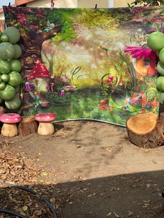 there is a sign that has been decorated with mushrooms and trees in the background, along with other decorations