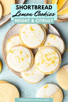 shortbread lemon cookies with white frosting on a plate