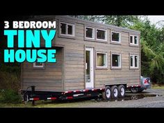 three bedroom tiny house on wheels with the words 3 bedroom tiny house on the trailer