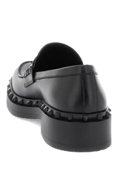 Valentino Garavani's Rockstud M-Way loafers are crafted in smooth leather and adorned with a rubber tone-on-tone studded trim. The lining and insole are made of leather, while the sole features embossed studs. These stylish loafers are perfect for adding a touch of edginess to any outfit. Studded Loafers, Leather Cap, Boot Pumps, Beach Tote Bags, Sneaker Heels, Handbag Backpack, Lanvin, Pump Shoes, Mens Shoes Sneakers