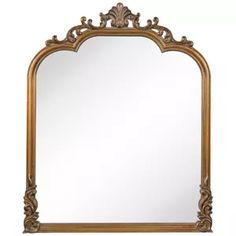 an ornate gold framed mirror on a white background