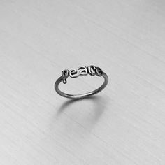 Sterling Silver Small Lower Case Font Peace Ring, Toe Ring, Midi Ring, Pinky Ring, Index Ring, Thumb Ring, 925 Sterling Silver, Face Height 3 Mm (0.12 Inch) Cheap Sterling Silver Toe Ring Midi Rings, Sterling Silver Spiritual Toe Ring, Minimalist Adjustable Nickel-free Toe Rings, Silver Spiritual Toe Ring Jewelry, Spiritual Nickel-free Toe Rings, Peace Ring, Midi Rings, Thumb Rings, Pinky Ring