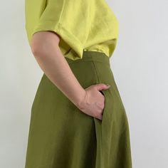 "Handmade olive color linen long wrap skirt with pockets, perfect for casual wear and suitable for any occasion in any season Details: - 100% natural linen produced in Europe ; - medium weight (180 gram per square meter); - color: could be any from our colors catalog (color samples at the photo); Made to order, approximately a few days, If you have any questions please message me and I will be glad to answer. Size guide : Size XS Bust: fits bust around 33\"-34\"/ 84-88 cm Waist: fits waist aroun Linen Green Lined Skirt Bottoms, Green Linen Lined Skirt Bottoms, Flowy Green Maxi Skirt With Pockets, Green Maxi Skirt With Pockets For Summer, Green Linen Relaxed Fit Skirt, Green Linen Skirt For Summer, Summer Linen Green Skirt, Summer Green Linen Skirt, Solid Long Linen Skirt