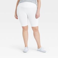 Take on your active or off-duty day in stylish comfort in these High-Waist Seamless 7" Inseam Bike Shorts from A New Day™. The high-rise bike shorts are cut from soft and stretchy fabric with a seven-inch inseam for a comfortable fit that moves with you. The high-rise cut gives you a flattering fit, while the cotton gusset offers breathable comfort. Pair them with a flowy top and flats for an effortless-chic look, or go casual with a tee and sneakers. Casual White Compressive Athletic Shorts, White Short Length Activewear With 4-way Stretch, White Compressive Biker Shorts, White Biker Shorts For Yoga, White Stretch Athletic Shorts, Mid-thigh Length, White Moisture-wicking Shorts, Mid-thigh Length, White Stretch Athletic Shorts Mid-thigh Length, White Moisture-wicking Mid-thigh Length Shorts, White Moisture-wicking Mid-thigh Shorts