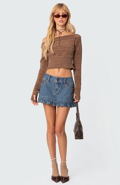 This sleek shoulder-baring sweater is knit in a cool cropped silhouette. Off-the-shoulder neck Long sleeves with thumbhole cuffs Ribbed cuffs and hem 100% polyester Machine wash, dry flat Imported Mini Skirt Pleated, Denim Pleated Skirt, Visionary Fashion, Skirt Pleated, Swimwear Dress, Crop Sweater, Washed Denim, Boat Neckline, Brown Sweater