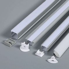 three different sizes and shapes of led tubes