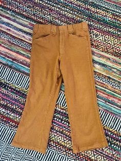 These are the sickest pair of 70’s wool tweed like pants They have been altered for shorter length Small bells Western pants Pockets Great belt loops Not itchy at all they are pretty soft Great vintage condition No tag with size seems like a small/medium Measurements taken flat are Waist: 15 in Hips: 16 in Rise: 11.5 in Inseam: 23.5 in Full length: 34 in long All sales are final Thanks for checking out Cereal Vintage Thrift Recycle Reuse Recreate 70s Inspired Wide Leg Pants For Fall, Vintage Wide Leg Pants For Winter, Fall Flare Pants With Belt Loops, 70s Inspired Fitted Pants For Fall, Fitted 70s Inspired Fall Pants, Retro Brown Pants For Fall, 70s Inspired Fitted Fall Pants, Retro Fitted Wool Bottoms, 70s Inspired Straight Leg Pants For Fall