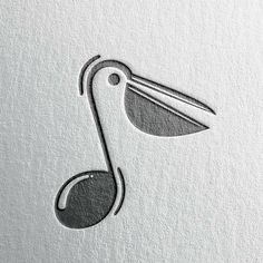 a bird with a long beak is shown on the side of a piece of paper