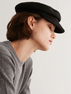 - Newsboy cap design- Adjustable velcro bandMeasurements- Brim: 1.9in- Height: 2.7in- Hat circumference: 21.6in-22.8inComposition - 100% WoolDesigner- Made in Korea- by NUHAT- Style# 300750936 Black Wool Beret Cap, Curved Brim Winter Hat For Work, Black Winter Visor Baseball Cap, Black Beret With Short Brim For Fall, Black Wool Cap For Winter, Black Wool Beret, Winter Classic Baseball Cap With Short Brim, Black Baseball Cap For Fall, Black Brimmed Beret For Fall