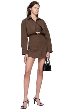 Brown 'La Robe Baunhilha' Minidress by Jacquemus on Sale Knee-length Cotton Shirt Dress With Buttoned Pockets, Chic Cotton Mini Dress With Pockets, Long Sleeve Cotton Mini Dress For Work, Collared Cotton Mini Dress With Pockets, Cotton Mini Shirt Dress With Pockets, Mini Shirt Dress With Button Cuffs For Workwear, Cotton Dresses With Patch Pockets, Button-up Mini Dress With Button Cuffs For Work, Cotton Mini Dress With Button Closure For Work