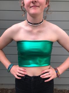 Green Spandex Tube Top. Great for Raves, tailgates, or parties. Stays on great and you won't have to worry about it always slipping down. Made from a green polyester spandex blend fabric and normal sewing thread. Great gift for a birthday, holiday or even a treat for yourself. All of my tops are made to order so if you have a special request you can leave me a note with your order telling me your exact size specifications. If you don't see your size, if you need the shirt bigger or smaller just Rave Shirt, Green Tube Top, Rave Shirts, Blue Choker, Spandex Top, Tube Tops, Cropped Tube Top, Green Top, Green Tops