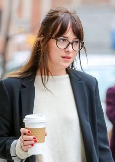 Bangs And Glasses, Dakota Johnson Street Style, Woman With Glasses, Dakota Style, Half Bun, Walking Down The Street, Anastasia Steele