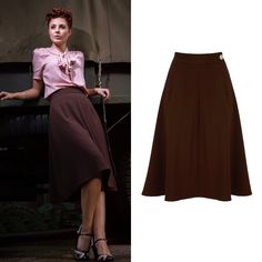 Have you ever struggled to find a classic and elegant skirt you can style for work and evening glam? Our flattering A-line skirt is the perfect addition to your wardrobe. It's made in a beautiful heavyweight crepe fabric and features a side pocket, side zipper and a contrasting natural Corozo button. This design drapes perfectly at or just below the knee and has an authentic vintage feel to complete your look. Why not pair it with a t-shirt or cropped sweater to complement your style. This versa Chic A-line Skirt For Semi-formal Occasions, Classic Knee-length Party Skirt, Classic Knee-length Skirt For Party, Chic A-line Semi-formal Skirt, Elegant Full Skirt For Office, Fitted A-line Skirt For Workwear, Classic Knee-length Evening Skirt, Classic Knee-length Skirt For Evening, Classic Evening Flared Skirt