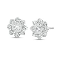 Experience the whimsy of these charming diamond flower stud earrings. Created in sterling silver, each delightful earring showcases a petite diamond - artfully set to enhance size and sparkle. Surrounding the center, pointed petal shapes shimmer with diamonds. Captivating with 1/6 ct. t.w. of diamonds and a bright polished shine, these post earrings secure comfortably with friction backs. Silver Flower Earrings With Diamond Accents, Fine Jewelry Diamond Earrings In Flower Shape, Flower Shaped Diamond Earrings In Fine Jewelry Style, Fine Jewelry Flower-shaped Diamond Earrings, Fine Jewelry Flower-shaped Earrings With Single Cut Diamonds, Flower Shaped Earrings With Single Cut Diamonds, Fine Jewelry Diamond White Flower-shaped Diamond Earrings, Diamond White Flower-shaped Earrings With Diamond Accents, White Gold Sterling Silver Flower Earrings