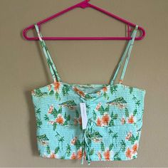 Very Cute Cropped Top! The Straps Are Removable So Can Be Worn As A Strapless Bandeau Also. Baby Blue, Tropical Floral Hibiscus Print, Bust Area Can Be Cinched, Is Brand New With Tags! Material: 60% Cotton, 40% Polyester Size: Large Sleeveless Ruched Smocked Top For Beach, Green Smocked Top For Vacation, Casual Green Smocked Top For Beach, Spring Beach Crop Top With Drawstring, Summer Beach Smocked Ruched Top, Casual Crop Top With Smocked Back For Vacation, Summer Crop Top With Smocked Bodice, Summer Ruched Tops For Beach Season, Ruched Summer Tops For Beach Season