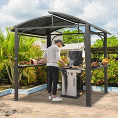 a woman cooking food on an outdoor grill