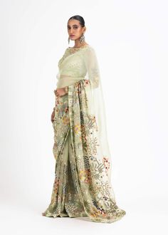 Elevate your style with our olive green organza sari blouse. This blouse is delicately embroidered with multicolored resham, beads, and sequins, adding a vibrant and eye-catching touch to your ensemble. It's the perfect choice for a touch of sophistication and charm in your attire. Party Wear Unstitched Organza Blouse Piece, Party Wear Unstitched Blouse Piece In Organza, Party Wear Saree Blouse With Intricate Embroidery, Unstitched Green Organza Choli, Green Georgette Dupatta With Intricate Embroidery, Elegant Green Dola Silk Embroidered Fabric, Elegant Green Embroidered Dola Silk Fabric, Green Saree With Resham Embroidery For Party, Party Wear Blouse With Intricate Embroidery In Tissue Silk