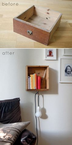 a book shelf with books and a phone on it next to a wall mounted photo