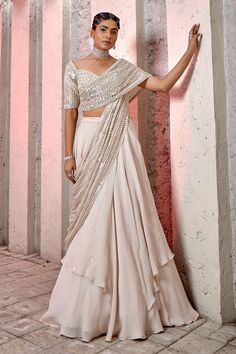 Buy Ivory Georgette Embroidered Floral V Neck Draped Choli And Lehenga Set For Women by Miku Kumar Online at Aza Fashions. Aza Fashion Lehenga, Indian Western Outfits, Designer Drape Dresses, Draped Lehenga, Drape Lehenga, Drape Sarees, Lehenga Pattern, Tattoo Fashion