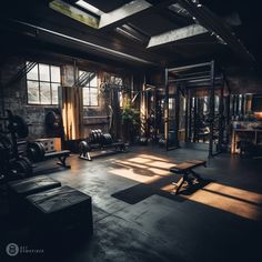 an empty gym with benches and equipment in the sun shining through the windows on the wall