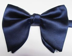 "Beautiful pre-tied and adjustable double tiered banded bow tie. Will adjust from 13\" through 20\" neck. Bow dimensions 2.5\" x 4.5\". Bow tie  Always made by hand and to your special order. Weddings and groups are welcome." Adjustable Blue Satin Bow, Blue Tie With Decorative Bow For Parties, Pre-tied Decorative Bow Tie For Party, Pre-tied Bow Tie For Party, Pre-tied Bow Tie Back For Party, Blue Party Tie With Decorative Bow, Adjustable Satin Bow Tie For Parties, Adjustable Blue Bow For Formal Occasions, Blue Party Bow Tie With Tie Back