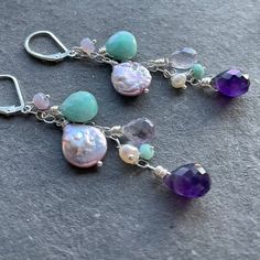 *please note if you are purchasing on facebook or instagram shops you will receive this item in sterling silver with a hook earwire, not the leverbacks shown, with no metal options. I designed this cascade of color for my February birthstone/birthday people. Happy Birthday! I've used scorolite opal, purple freshwater pearls, amazonite, amethyst in purple and pink (it's a lavender) and freshwater pearls. Please choose your earwire and metal choice. These are wired sterling silver on sterling silv Sterling Silver Chandelier Earrings With Lever Back As Gift, Silver Sterling Chandelier Earrings With Natural Stones, Sterling Silver Teardrop Chandelier Earrings With Gemstones, Sterling Silver Gemstone Chandelier Earrings For Gift, Handmade Sterling Silver Teardrop Chandelier Earrings, Handmade Teardrop Sterling Silver Chandelier Earrings, Nickel-free Sterling Silver Earrings For Birthday, Nickel Free Sterling Silver Earrings For Birthday, Handmade Purple Sterling Silver Chandelier Earrings