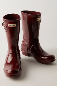 Get through rainy days with ease in these classic short rubber rain boots. In a matte rubber this style features a buckle accent on the side, logo detailing in front, and treaded rubber sole. * Pull-on style * Mid-calf height * Lifted heel | Hunter Short Wellies at Free People in Red, Size: US 7 Hunter Wellies Outfit, Wellies Outfit, Hunter Rubber Boots, Hunter Short, Red Rain Boots, Fox Shoes, Hunter Wellies, Rubber Boots, Christmas 2024