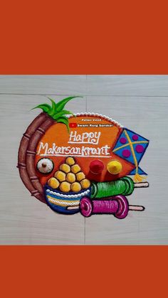 this is an image of a happy makarshrami greeting card with colorful items