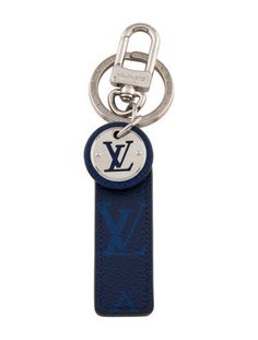 a blue key chain with a louis logo on the front and an oval metal ring