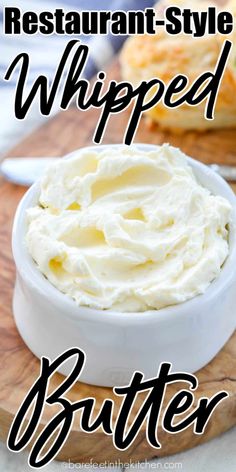 whipped butter in a white bowl on a cutting board with the words, restaurant style whipped butter