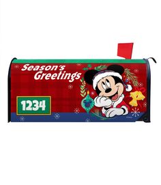 a red mailbox with mickey mouse on it's front and the words season's greetings below