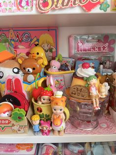 a shelf filled with lots of toys and other items on top of eachother