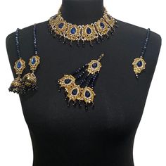 Elegant Jewellery set. Set includes- Earrings  Necklace Tikka Jhumar Elegant Blue Meenakari Necklace, Blue Bollywood Jewelry Sets For Gift, Blue Bollywood Style Jewelry Sets For Gift, Sapphire Jewelry Sets For Wedding, Blue Kundan Necklace For Celebration, Elegant Blue Kundan Necklace With Meenakari, Blue Bollywood Jewelry Sets With Stone Work, Blue Jewelry Sets With Stone Work For Wedding, Blue Hand Set Jewelry Sets For Wedding