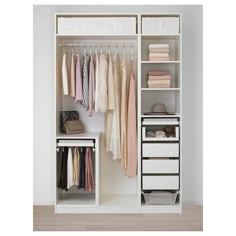 an organized closet with clothes and other items