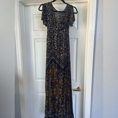 Size Medium, Tags Were Cut Out By My Friend Who Owned It Before Me. I Only Wore Once. Otherwise Looks Brand New. Lined And So Not See Through. Tie Back. Cute Slits In Flutter Sleeve Casual Black Dresses With Boho Print, Casual Black Dress With Boho Print, Casual Black Boho Print Dress, Black Boho Print Maxi Dress, Casual Black Maxi Dress With Boho Print, Black Boho Print Maxi Dress For Vacation, Fitted Black Maxi Dress With Boho Print, Black Short Sleeve Sundress Maxi Dress, Black Rayon Maxi Dress With Short Sleeves