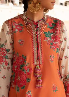 Embellished Simple Long Salwar Kameez Pakistani Party Dress comes in embellished work of Thread and Resham on front embroidered organza patch with organza embroidered back and embroidered sleeves. The fabric used for this Orange Salwar Kameez is cotton. Net embellished dupatta is paired with this Pakistani Dress. Detailed Description: SKU: PN614 Detailing: Beads, Pearls, Embroidery, Sequins, Motifs Color: Orange Fabric: Lawn, Cotton Design: Fully Embellished Dress with Embroidery, Sequins, Motif Festival Embellished Straight Kurta, Chanderi Floral Embroidered Dress For Eid, Embellished Kurta For Navratri Festival, Embellished Kurta For Festive Navratri Occasions, Navratri Festive Embellished Kurta, Navratri Long Sleeve Embellished Kurta, Embellished Long Sleeve Kurta For Navratri, Silk Embroidered Dress With Floral Design For Eid, Silk Embroidered Dress With Floral Embroidery For Eid