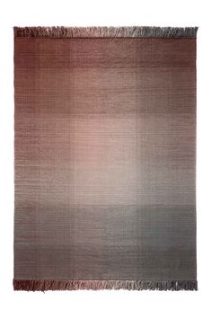 an area rug with fringes on the bottom and sides in grey, pink and brown colors